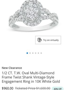Zales White Gold Oval Diamond Halo Ring with Twisted Shank